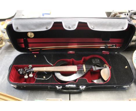 An unusual Stagg S Form electric violin, with modern plush lined case with hygrometer