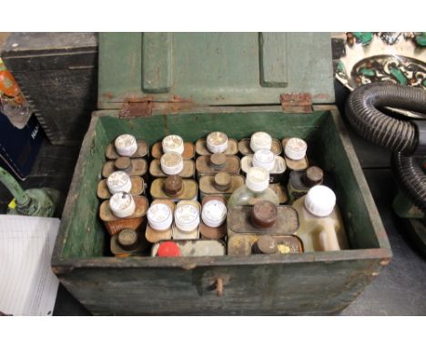 Vintage green stained pine toolbox with various wood treatments