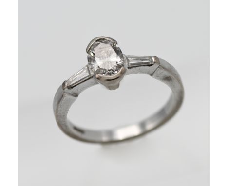 A good 18ct five single stone diamond ring set in white gold, set with two shoulder diamonds, size M.