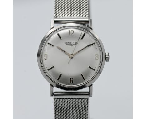 Longines, a gents manual wind wristwatch, on stainless steel strap.