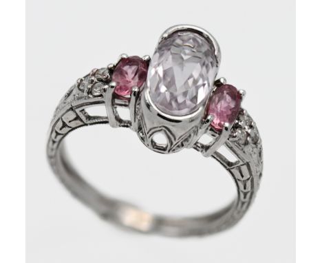 A 14k white gold ring set with a pink sapphire, diamond and kunzite, size N
