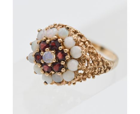 A large 9ct yellow gold opal and garnet dress ring, size Q.