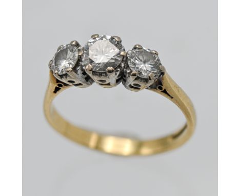 An 18ct diamond three stone ring, set with modern brilliant cut diamonds, approx 0.95ct, finger size K.