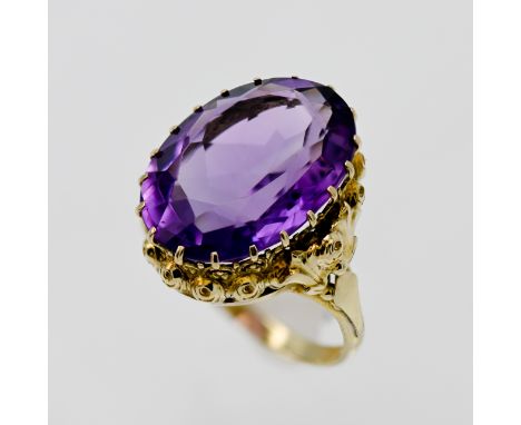 A large 14ct yellow gold amethyst ring, size L/M