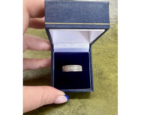A half channel white gold ring, 18k white gold set, 9x baguette cut diamonds, size O/P, approx 6.5g, approx total weight diam
