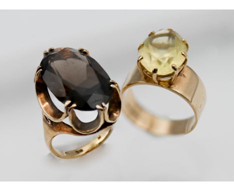 A 9ct yellow gold ring set with large stone together with another ring set with dark stone (hallmark rubbed), approx 12g