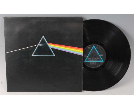 Pink Floyd - Dark Side Of The Moon, Harvest EMI SHVL 804 A-9 / B-9, in gate-fold sleeve with two posters and two stickers. (1