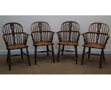 Set four 19th century ash and elm low back Windsor armchair, pierced splat and stick back, turned supports joined by 'H' stre