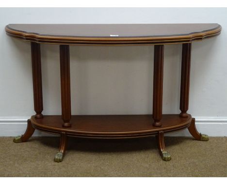 Reproduction mahogany Demi lune console table, moulded top, column supports joined by solid undertier, hairy paw brass capped