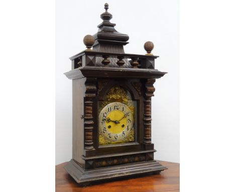 Large Edwardian stained and walnut architectural cased mantel clock with arched brass Roman dial, twin train movement half ho