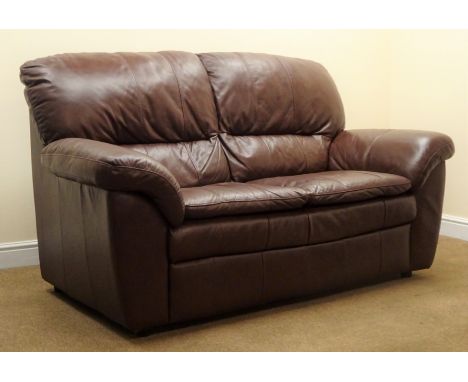 Two seat sofa upholstered in brown leather (W175cm) and matching armchair (W110cm) Condition Report Click here for further im