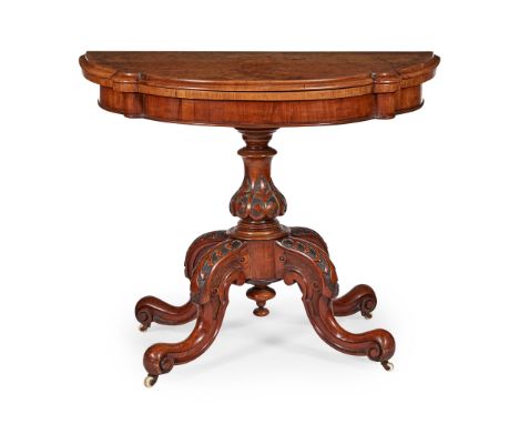 VICTORIAN WALNUT GAMES TABLE MID 19TH CENTURY the shaped demilune fold-over top opening to a green baize playing surface, rai