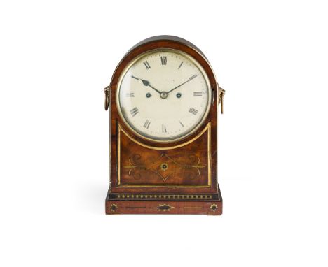 LATE REGENCY MAHOGANY, EBONY, AND BRASS INLAID MANTEL CLOCK, BY MOLYNEUX, LONDON EARLY 19TH CENTURY the arched case enclosing