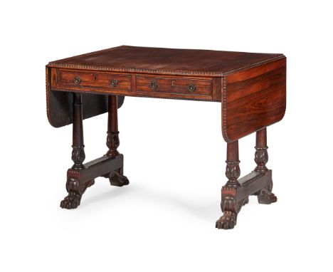 Y REGENCY ROSEWOOD SOFA TABLE EARLY 19TH CENTURY the rounded rectangular top with drop-leaf ends and a bead moulded edge, abo