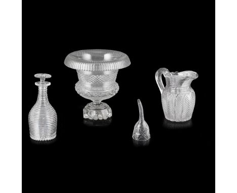 FOUR PIECES OF REGENCY ANGLO-IRISH CUT GLASS EARLY 19TH CENTURY comprising a footed fruit dish, a pitcher, 19cm high; a decan