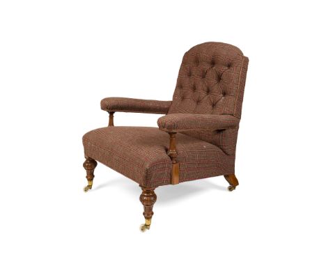 VICTORIAN HOWARD &amp; SONS TYPE MAHOGANY UPHOLSTERED ARMCHAIR 19TH CENTURY with an arched button back and open arms on turne
