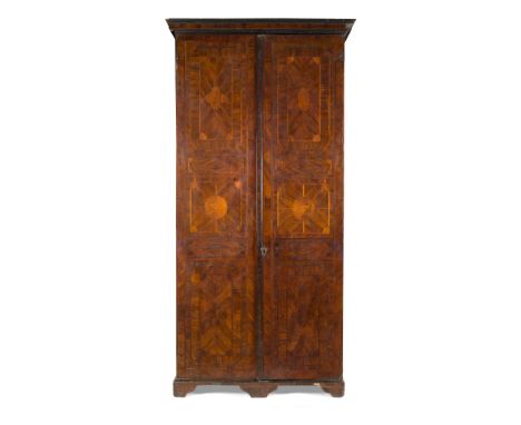 ITALIAN PARQUETRY-INLAID WALNUT ARMOIRE 18TH CENTURY the moulded cornice above a pair of parquetry-inlaid doors enclosing she