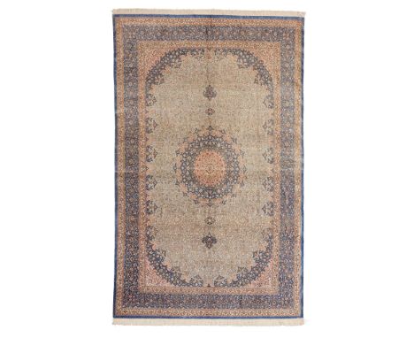 FINE SILK QUM CARPET CENTRAL PERSIA, MODERN the light blue field with darker blue and pink medallion, similar spandrels, with