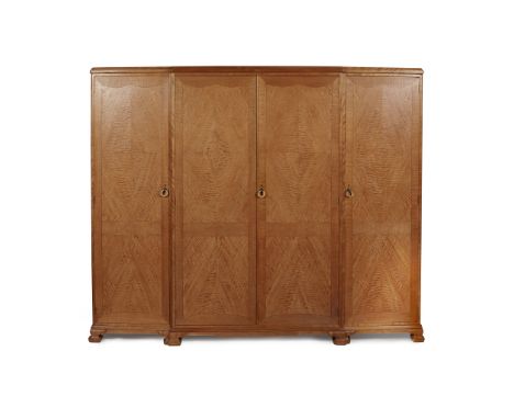 Y WHYTOCK &amp; REID ART DECO TIGER MAPLE, SATIN BIRCH, AND MAHOGANY WARDROBE MID 20TH CENTURY the moulded breakfront cornice