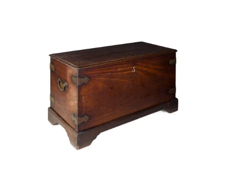 GEORGE III MAHOGANY BRASS BOUND CHEST LATE 18TH CENTURY with a hinged lid and brass carrying handles, the corners with shaped