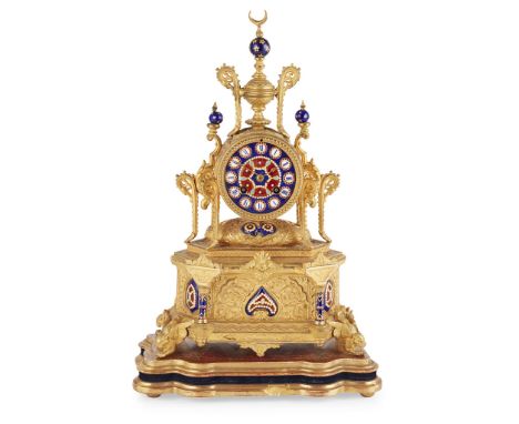 FRENCH GILT METAL AND ENAMEL MANTEL CLOCK FOR THE TURKISH MARKET 19TH CENTURY the circular dial enamelled in blue and red wit