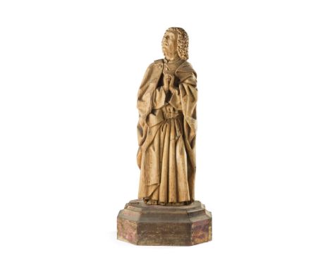 NETHERLANDISH CARVED OAK FIGURE OF ST. JOHN THE EVANGELIST 16TH CENTURY the standing figure with tightly curled hair, his hea