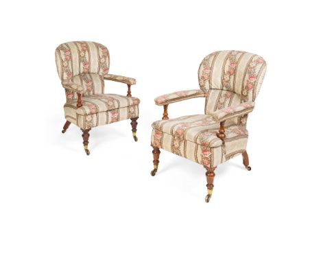 PAIR OF VICTORIAN MAHOGANY UPHOLSTERED ARMCHAIRS MID-19TH CENTURY with rounded arched backs and open arms on turned supports,
