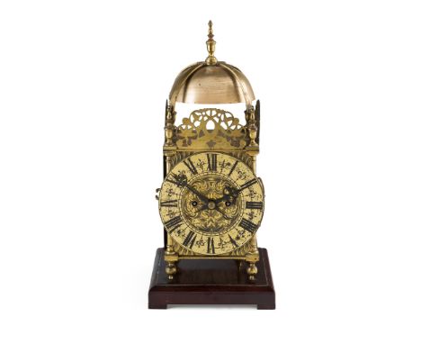 BRASS LANTERN CLOCK LATE 19TH/ EARLY 20TH CENTURY in the 17th century style, with a circular dial, characteristic case pierce