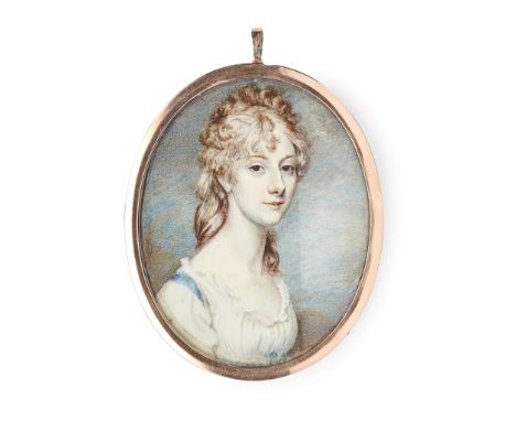 Y PORTRAIT MINIATURE OF A LADY ENGLISH SCHOOL, LATE 18TH CENTURY watercolour and body colour on ivory, the sitter with dark b