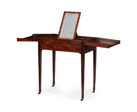 GEORGE III MAHOGANY DRESSING TABLE LATE 18TH CENTURY the divided hinged top opening to an arrangement of covered compartments