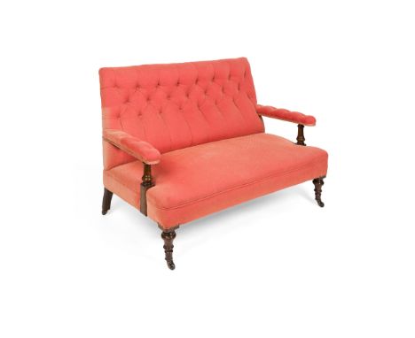 VICTORIAN MAHOGANY UPHOLSTERED SETTEE 19TH CENTURY with a rectangular button back, padded open arms and turned supports, rais