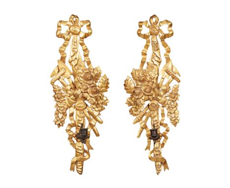 PAIR OF GILTWOOD WALL SCONCES EARLY 20TH CENTURY the carved ribbon-tied backplates with flowers, gardener's tools, and draper