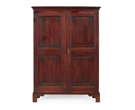 GEORGE III MAHOGANY CUPBOARD 18TH CENTURY the moulded cornice above a pair of panel doors opening to a painted shelved interi