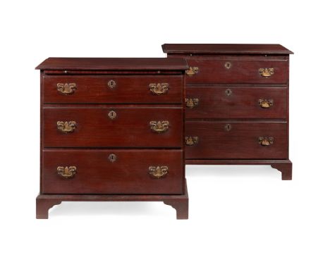 PAIR OF IRISH GEORGE III MAHOGANY CHESTS OF DRAWERS 18TH CENTURY the tops with moulded edges above brushing slides and three 