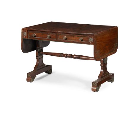 Y GEORGE IV ROSEWOOD AND BRASS INLAID SOFA TABLE EARLY 19TH CENTURY the rounded rectangular top with drop-leaf ends, outlined