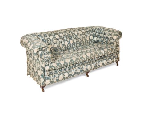 LATE VICTORIAN UPHOLSTERED CHESTERFIELD SOFA LATE 19TH CENTURY with a low button back, arms and seat covered in an Art Nouvea