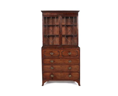 LATE GEORGE III MAHOGANY SECRETAIRE BOOKCASE LATE 18TH CENTURY of neat size, the moulded cornice above a pair of astragal gla