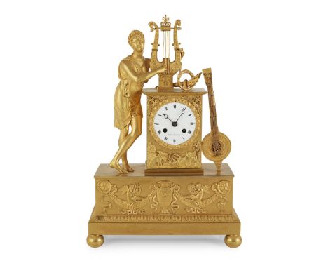 FRENCH EMPIRE SCULPTURAL GILT BRONZE MANTEL CLOCK EARLY 19TH CENTURY the white enamel Roman numeral dial with twin winding ho