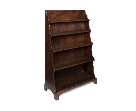 GEORGE III MAHOGANY WATERFALL BOOKCASE EARLY 19TH CENTURY with five stained pine graduated shelves, raised on shaped bracket 
