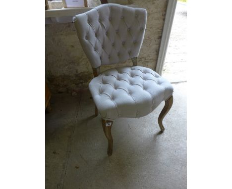 A button back bedroom chair 