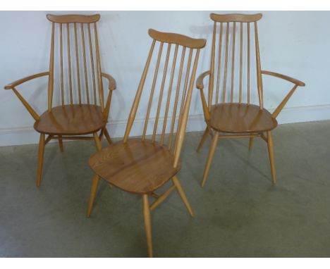 Three Ercol dining chairs - two carvers and one single stick back with solid seats and splayed supports