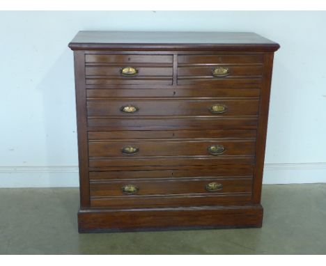 A late Victorian walnut two over three chest of drawers on a plinth base - Height 1.06 m x Width 1.05 m 