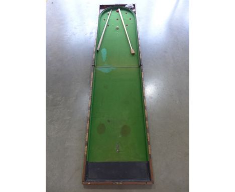 A mahogany and rosewood folding table top bagatelle board - 2.44 m x 60 cm open with balls and cue 