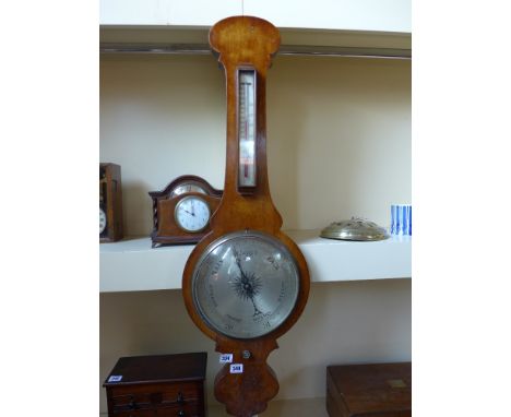 A 19th century mahogany wheel barometer 10" silvered dial with thermometer above - Height 1 m
Condition report: Working - plu