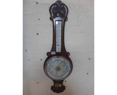 An oak Aneroid barometer with thermometer - Height 81 cm 
