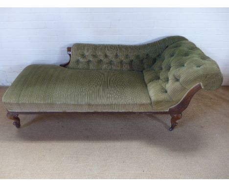 A Victorian carved walnut button back chaise lounge on shaped dwarf cabriole legs - Height 74 cm x Length 1.95 m x Depth 71 c