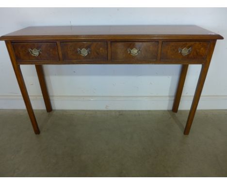 A walnut effect four drawer hall table - Height 76 cm x Width 1.26 m x Depth 35 cm 