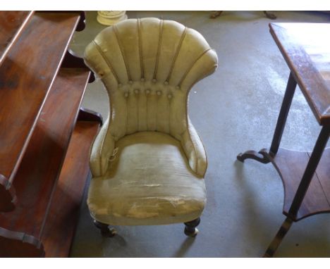 A pretty Victorian shell shaped button back upholstered child's chair on turned front legs and ceramic casters - Height 60 cm