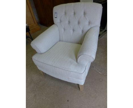 A Libra design shop soiled new button back armchair