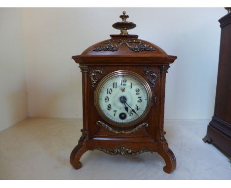 A small walnut case decorative mantel clock, brass decoration eight day clock - platform movement by Lenzkirch
Condition repo